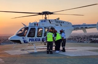 Ambulancia a&eacute;rea permite asistencia inmediata a mujer y su hijo accidentados en Pantepec